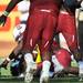 South Carolina defensive end Jadeveon Clowney reaches out and recovers a fumble after a hard tackle on Michigan running back Vincent Smith in the fourth quarter of the Outback Bowl at Raymond James Stadium in Tampa, Fla. on Tuesday, Jan. 1. Melanie Maxwell I AnnArbor.com